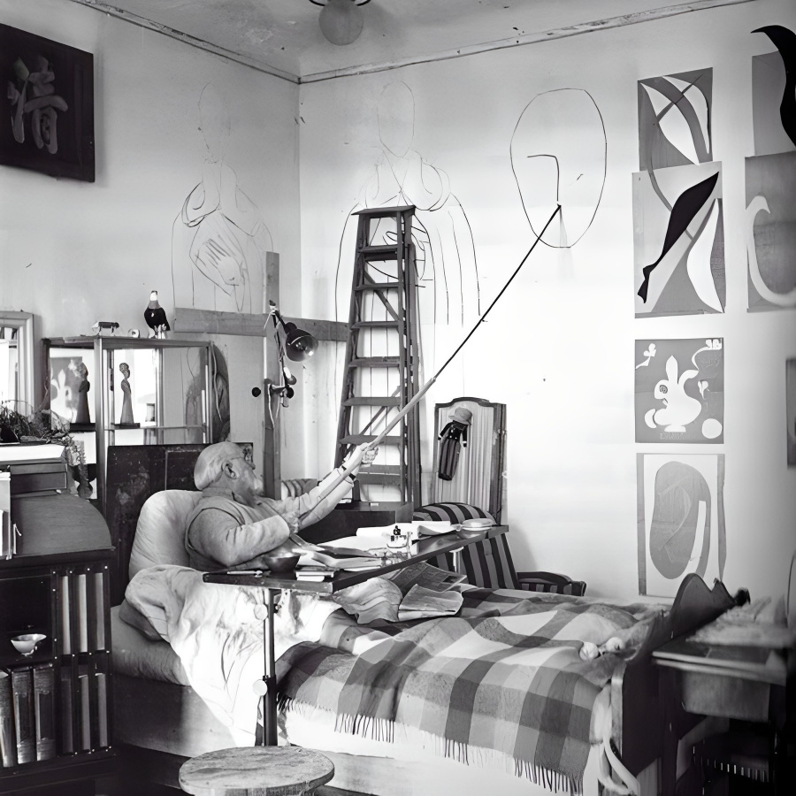 Henry Matisse drawing from his bed.