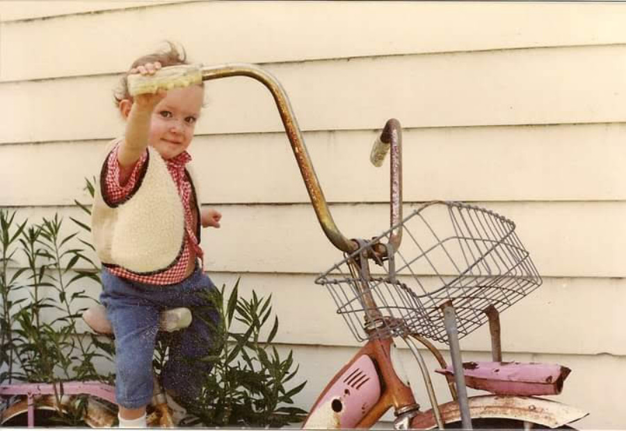 Naomi on a bicycle. Photo by Chip Pullin.