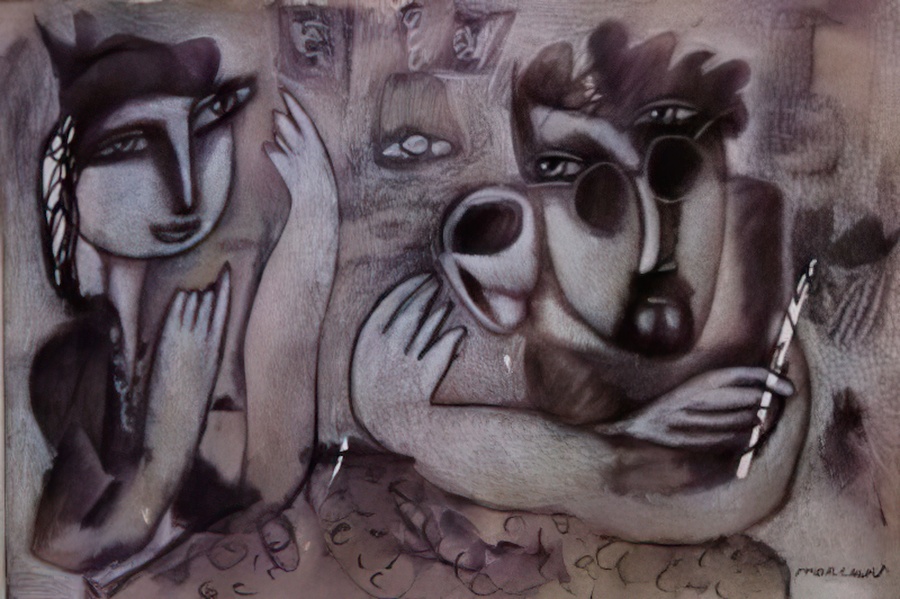 Two people having a conversation at the New Bohemian Coffee House.