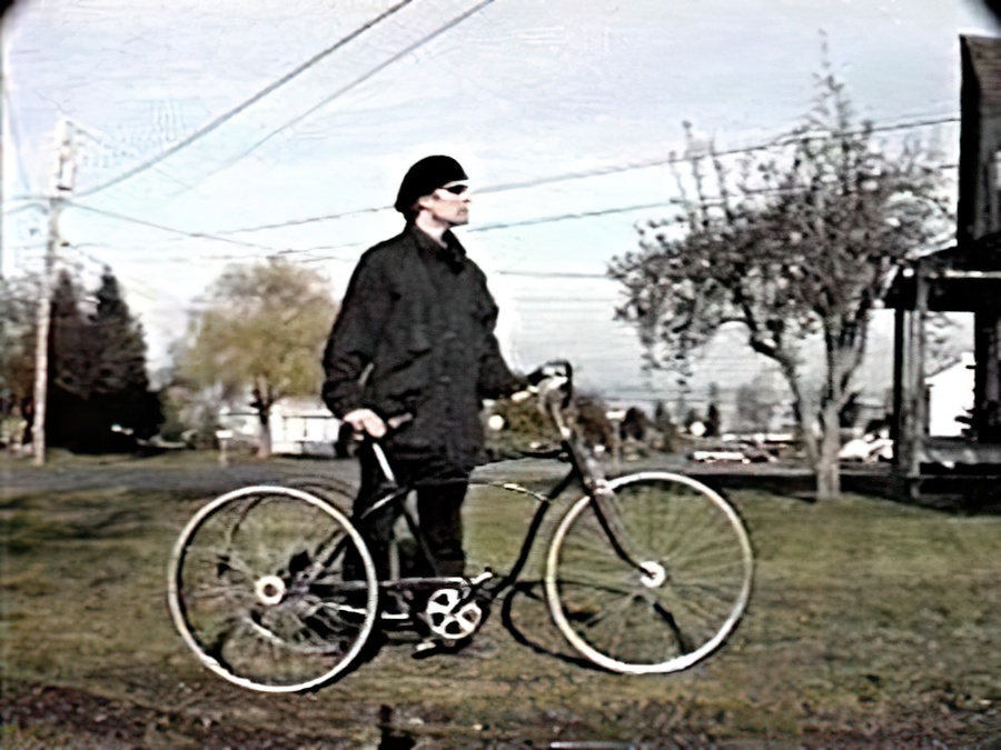 Me standing very proudly with my three wheeler bicycle.